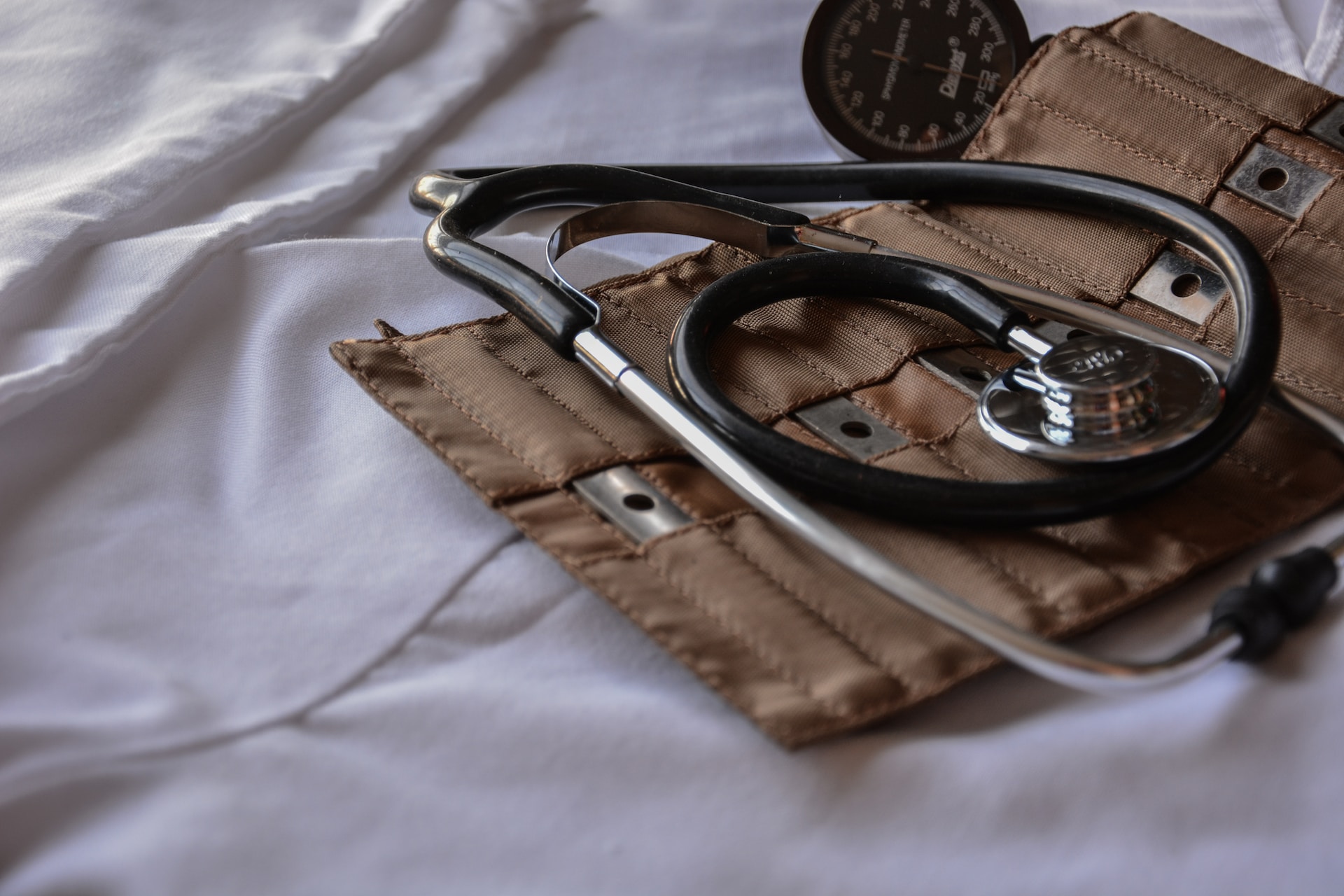 A stethoscope on a brown case 