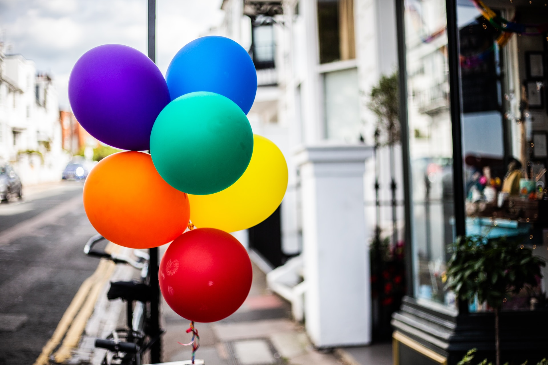 Colorful balloons on an empty street
