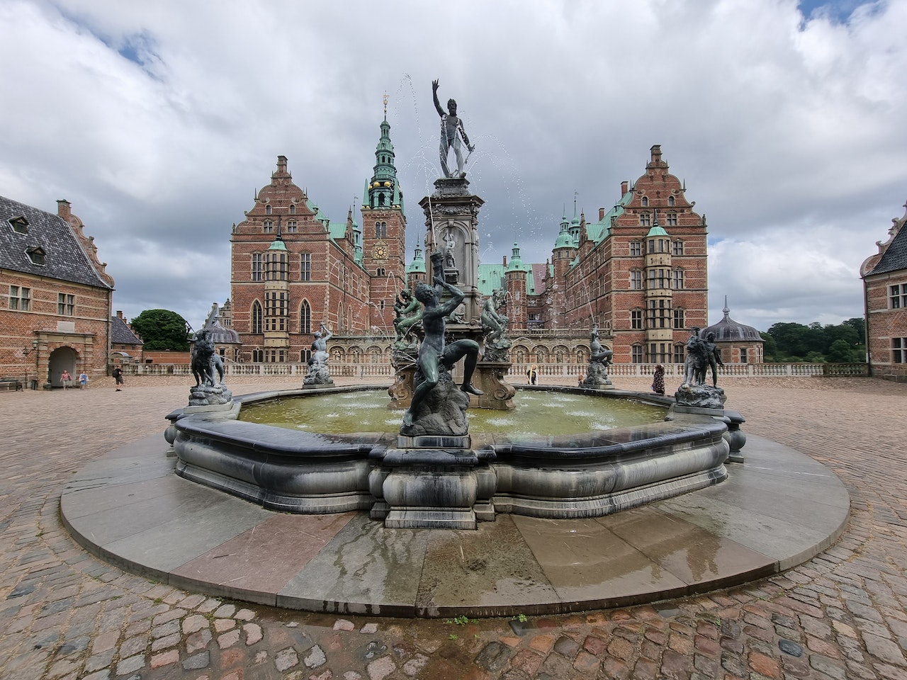 Frederiksborg Palace and Neptune fountain, in Denmark 
