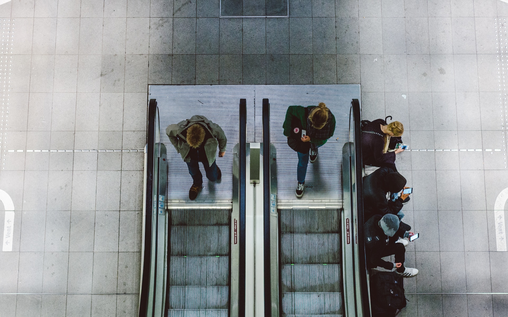 People using escalators 