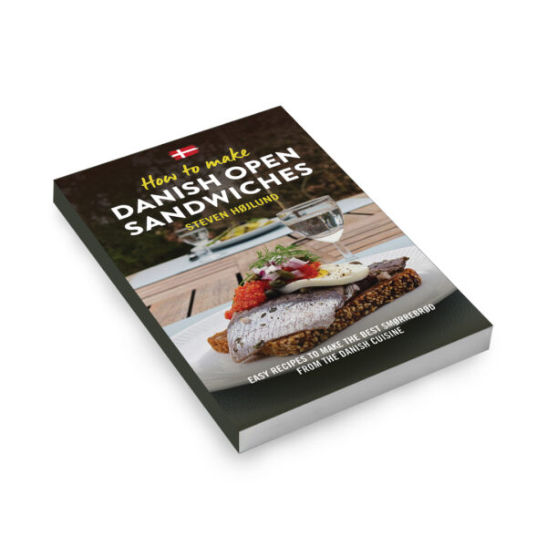 A book called How to make Danish open sandwiches on a white background